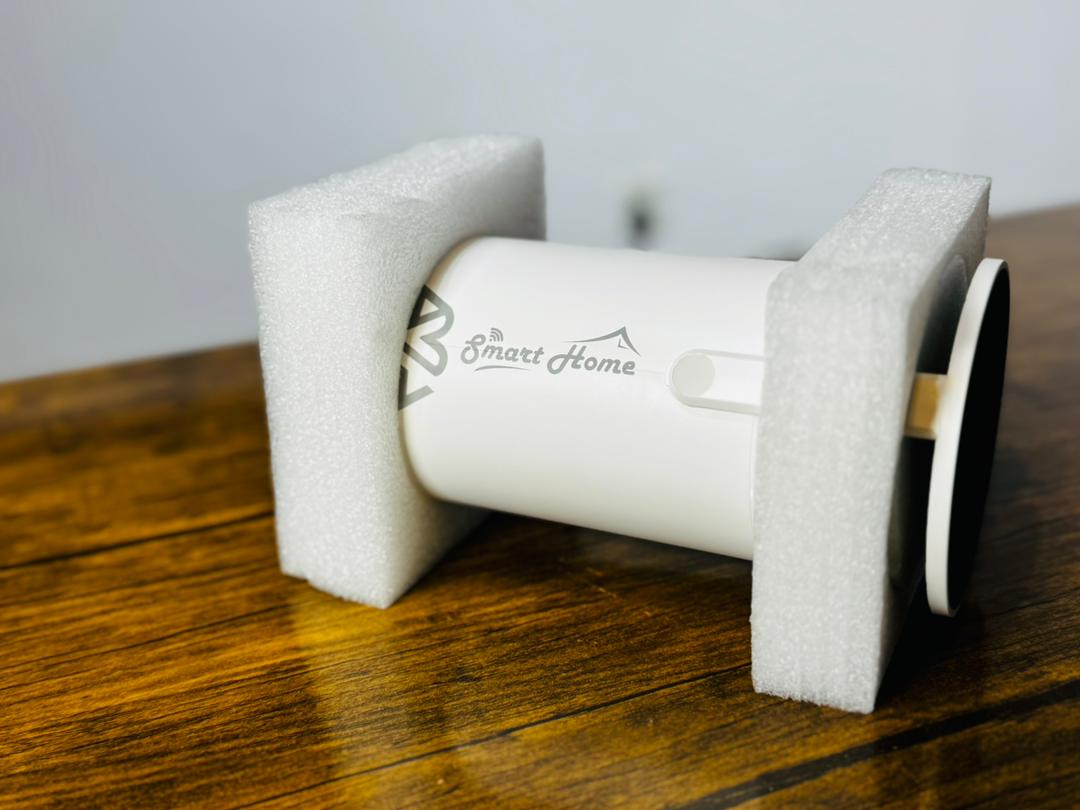 BSmart Home 4K Projector setup in living room with large screen display